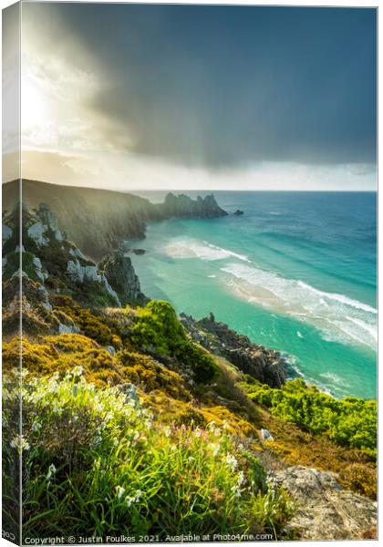 Spring showers over Porthcurno, Cornwall Canvas Print by Justin Foulkes