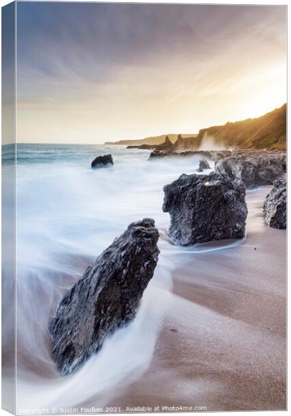 Rocks at Great Mattiscombe Sands, South Devon Canvas Print by Justin Foulkes