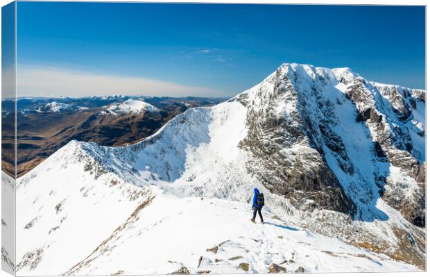 Mountaineer on the Carn Mor Dearg arete, Ben Nevis Canvas Print by Justin Foulkes