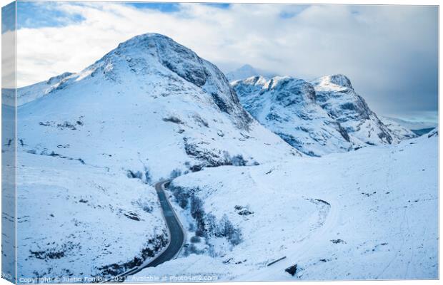 Glencoe in winter, Scottish Highlands Canvas Print by Justin Foulkes