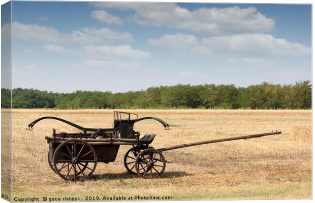 old fire wagon on field Canvas Print by goce risteski