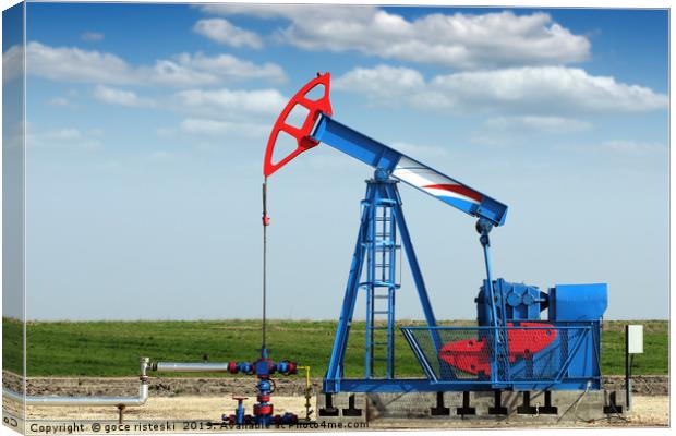 oil industry pump jack on oilfield Canvas Print by goce risteski