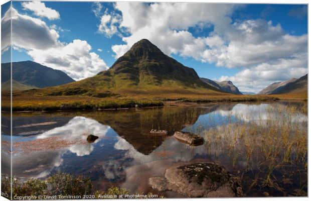 Reflections in the water at Glen Coe Valley  Canvas Print by David Tomlinson