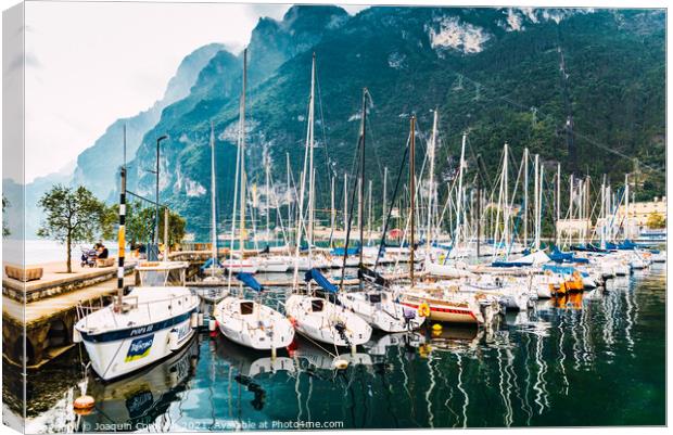 Riva del Garda, Italy - October 2, 2021: Boats and yachts moored Canvas Print by Joaquin Corbalan