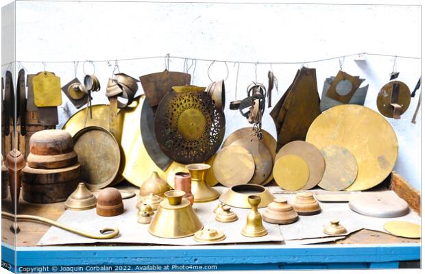 Brass materials in an old craft workshop. Canvas Print by Joaquin Corbalan