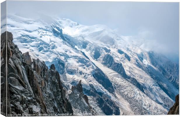 Spectacular mountain crags between glaciers in the alps. Canvas Print by Joaquin Corbalan