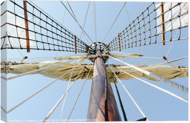 Mainmast and rope ladders to hold the sails of a sailboat. Canvas Print by Joaquin Corbalan