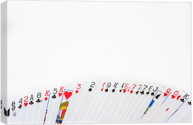 Deck of cards deployed with a white background and space for text. Canvas Print by Joaquin Corbalan