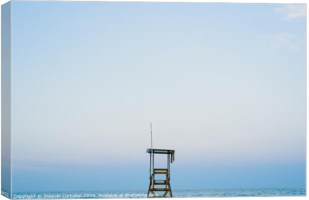 Lifeguard watchtower on the beach at sunset. Canvas Print by Joaquin Corbalan