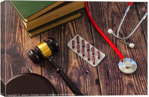 Gavel as a symbol of medical justice, applied by doctor judges. Canvas Print by Joaquin Corbalan