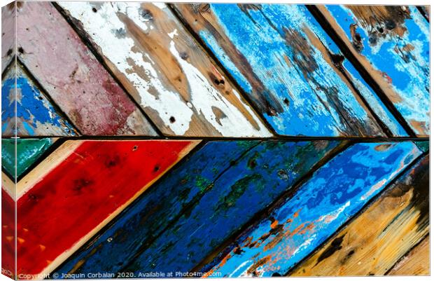 Painted wooden boards of various colors aged, natural texture background. Canvas Print by Joaquin Corbalan