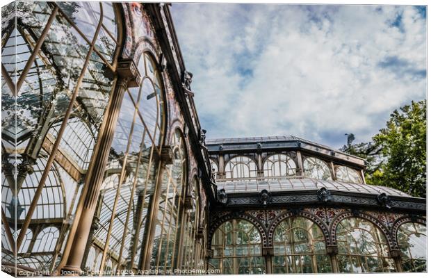 Exterior of the Crystal Palace in Madrid, a must for tourists, in the Retiro Park. Canvas Print by Joaquin Corbalan