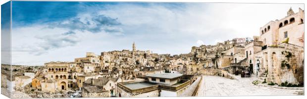 Long panoramic views of the rocky old town of Matera with its stone roofs. Canvas Print by Joaquin Corbalan