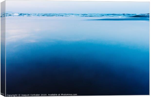 Silky calm water background with waves in the background and calm sea. Canvas Print by Joaquin Corbalan