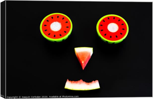 Composition of a funny face made with fruit, smile of a watermelon for summer diets. Canvas Print by Joaquin Corbalan
