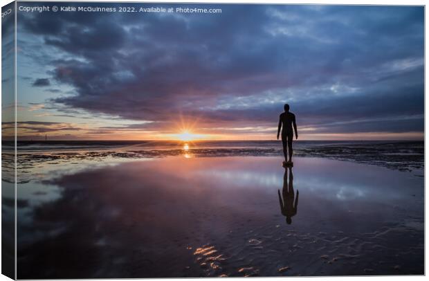 Moody sunset at Another Place on Crosby beach Canvas Print by Katie McGuinness