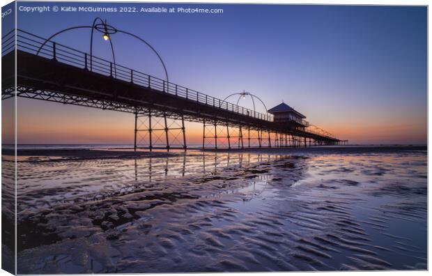 Sun setting behind Southport Pier, Merseyside Canvas Print by Katie McGuinness