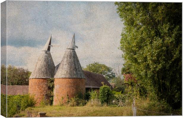 A farm in the countryside with an Oast House build Canvas Print by David Wall