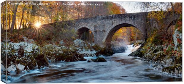 Falls of Feugh and bridge at sunrise Canvas Print by Mike Johnston