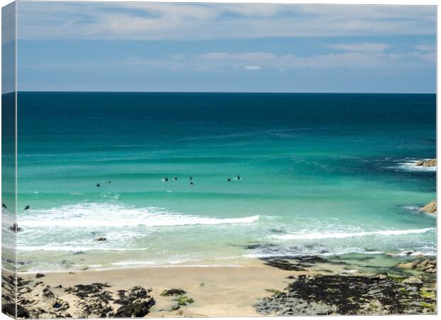 Surfers watching for waves at Little Fistral beach Canvas Print by Tony Twyman