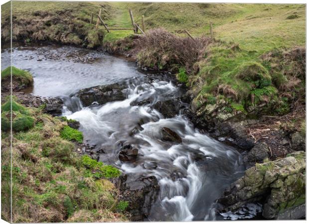 Top of Spekes Mill waterfall Canvas Print by Tony Twyman