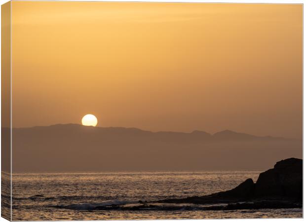 Sun setting behind La Gomera Canvas Print by Tony Twyman