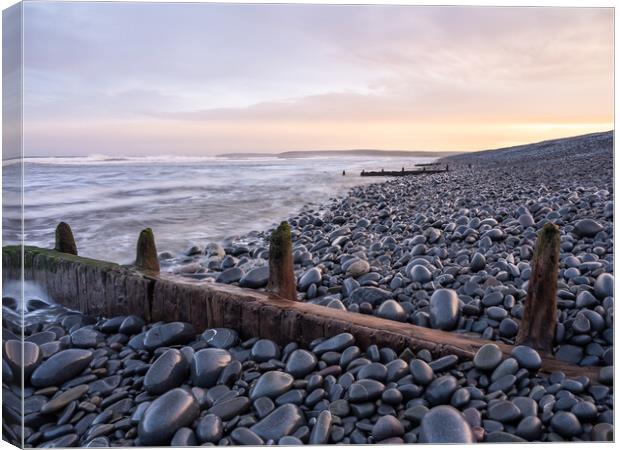 Sunrise beach breaks Canvas Print by Tony Twyman