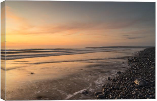 Westward Ho! sunset clouds at high tide Canvas Print by Tony Twyman