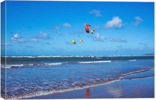 Kitesurfers at Westward Ho! in North Devon Canvas Print by Tony Twyman