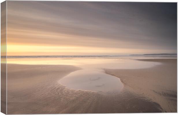 The tranqulity of a beach sunset Canvas Print by Tony Twyman