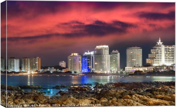 The City of Punta Del Este at night, Uruguay. Canvas Print by RUBEN RAMOS