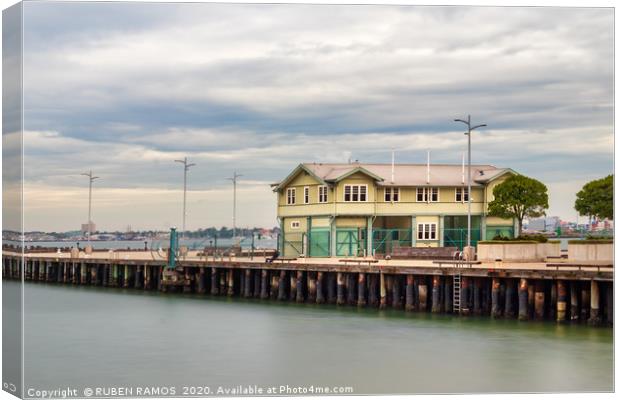Long exposure of the Princess Pier over a cloudy d Canvas Print by RUBEN RAMOS