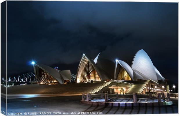 The Opera House and promenade at night, Sydney, Au Canvas Print by RUBEN RAMOS