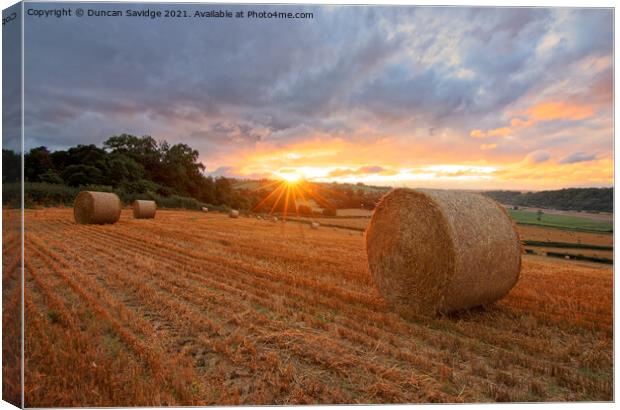 Harvest time sunset Canvas Print by Duncan Savidge