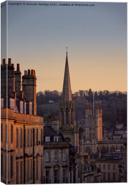 Winter sun hitting the Bath Abbey and surrounding sky line Canvas Print by Duncan Savidge