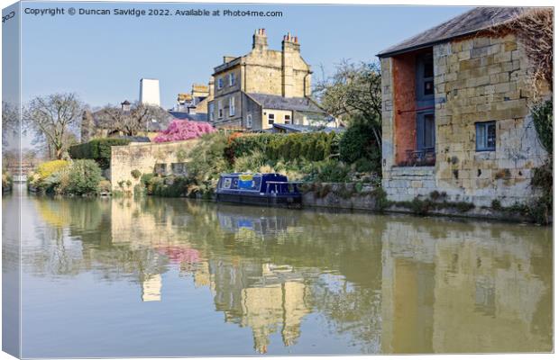 Kennet and Avon Canal, Bath, reflected in the Spring sunshine Canvas Print by Duncan Savidge