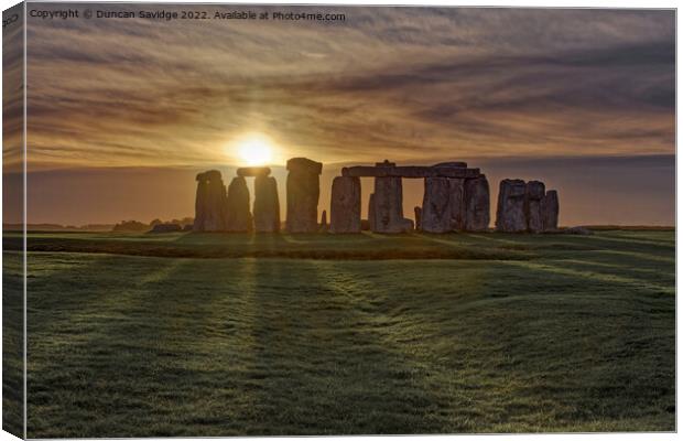 Stonehenge Winter Sunset sun stripes  Canvas Print by Duncan Savidge