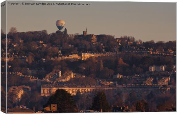 Hot air balloon floats over the golden Royal Crescent in winter  Canvas Print by Duncan Savidge