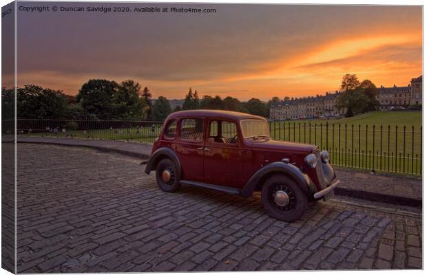 Royal Crescent Bath at sunset with an old fashioned car Canvas Print by Duncan Savidge