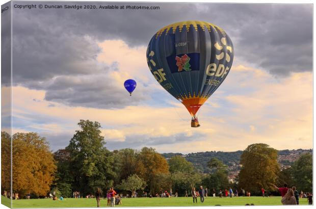 Hot air balloon lifting off from Royal Victoria Park Bath Canvas Print by Duncan Savidge