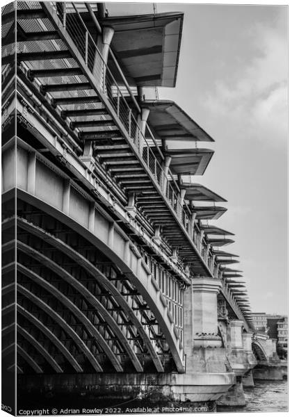 Twilight over the Monochrome Blackfriars Bridge Canvas Print by Adrian Rowley