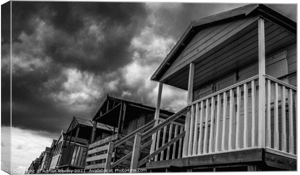 Whitstable Beach Huts in Monochrome Canvas Print by Adrian Rowley