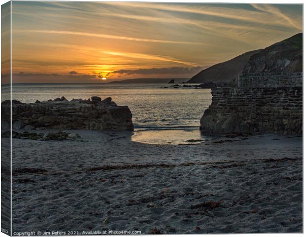 Portwrinkle Harbour under the setting Sun Canvas Print by Jim Peters