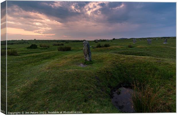 Lone stone at the hurlers  Canvas Print by Jim Peters