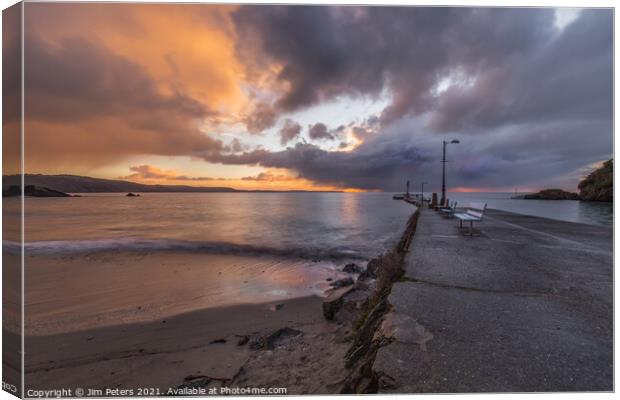 Looe Sunrise with distant rain cloud Canvas Print by Jim Peters