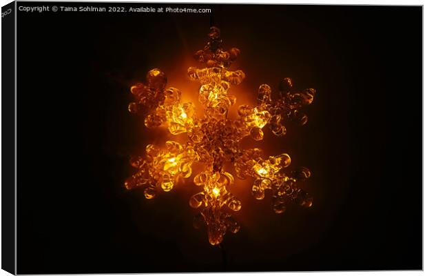 Illuminated Golden Christmas Light in Shape of Sno Canvas Print by Taina Sohlman