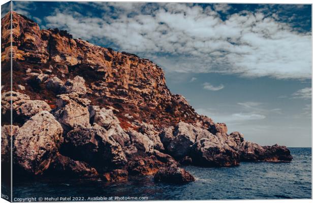 Rocky cliff face on south east coast of Menorca, Spain - Europe Canvas Print by Mehul Patel