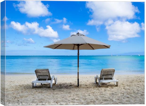 Two sun loungers and parasol on beach Canvas Print by Mehul Patel