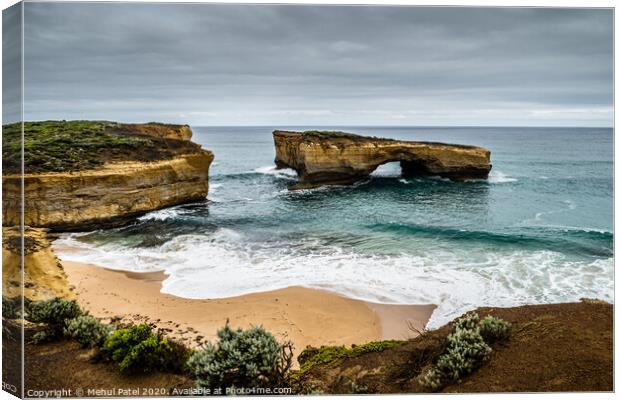 London Arch (London Bridge) rock formation on the coast by the Great Ocean Road, Victoria, Australia Canvas Print by Mehul Patel