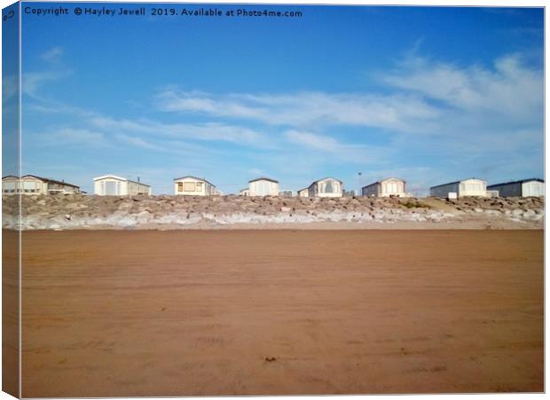 Caravans overlooking Brean Beach Canvas Print by Hayley Jewell